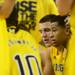 Michigan sophomore Trey Burke is seen in the team huddle during a timeout in the second half at Cowboys Stadium in Arlington, Texas on March 29, 2013. Melanie Maxwell I AnnArbor.com